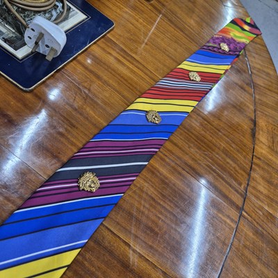 Lot 141 - Versace silk scarf belt with Medusa buttons.