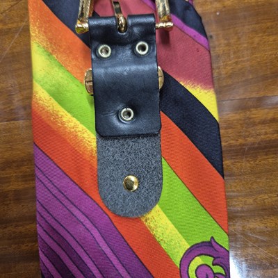 Lot 141 - Versace silk scarf belt with Medusa buttons.