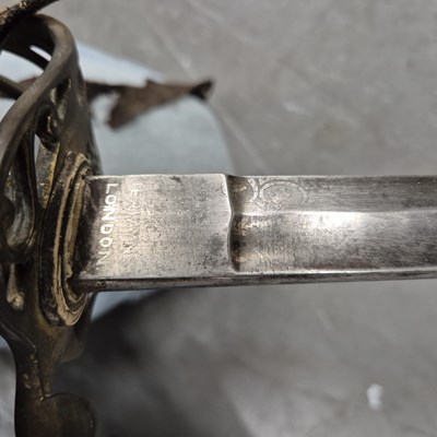 Lot 151 - A Victorian sword by Marshall in a brass...
