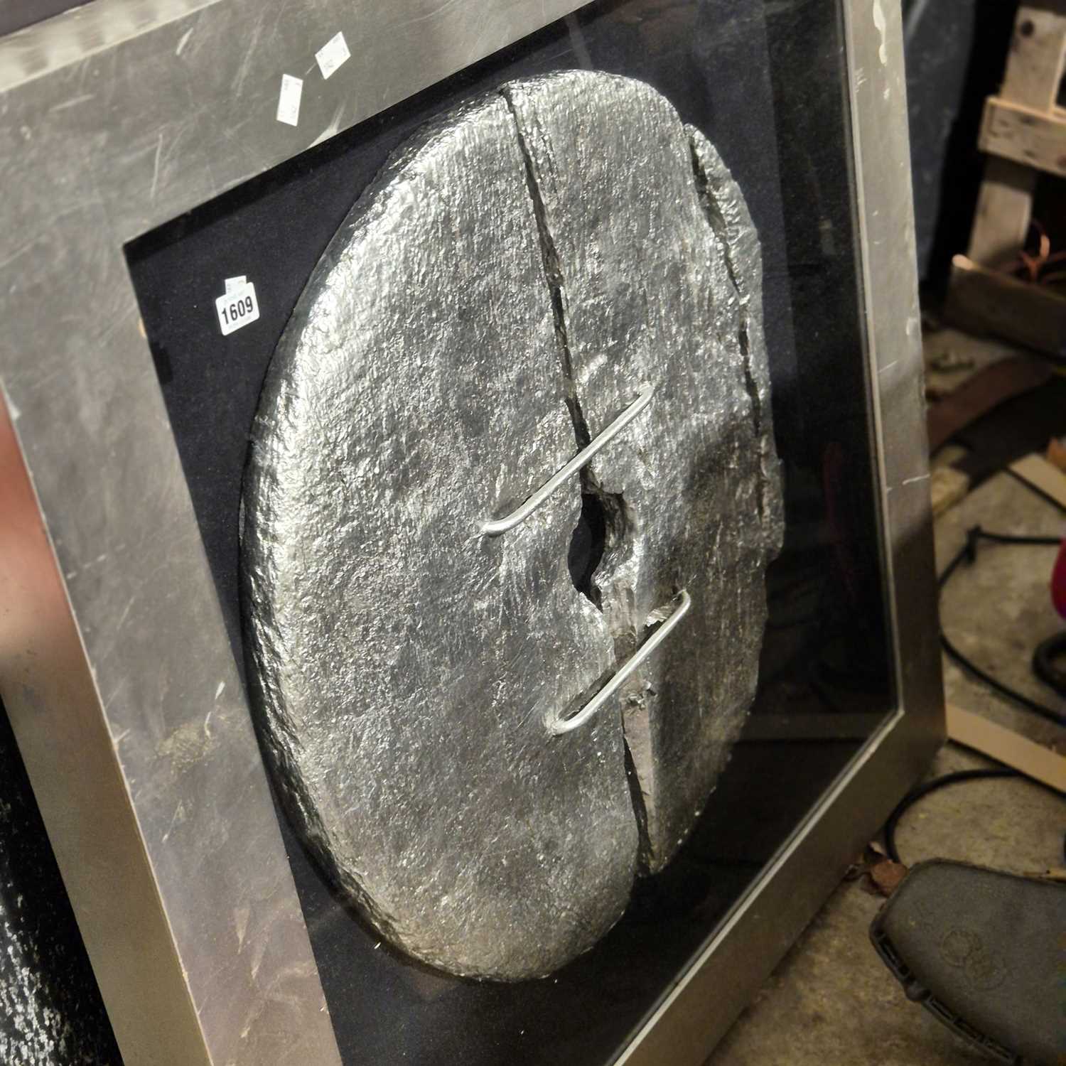 Lot 1609 - A framed, silvered rustic disc or wheel