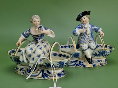 Lot 1489 - A pair of Meissen onion pattern figural double...
