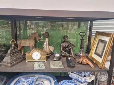 Lot 523 - Animal and human figures, a brass cased clock,...