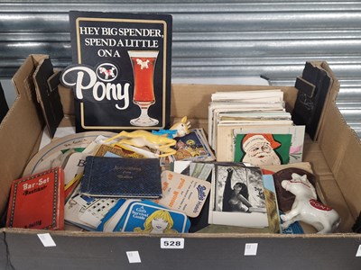 Lot 528 - Printed advertising ephemera, a Babycham deer...