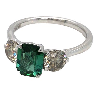 Lot 1030 - Platinum hallmark trilogy ring set with a step-...