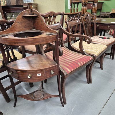 Lot 16 - A regency corner washstand and three dining...