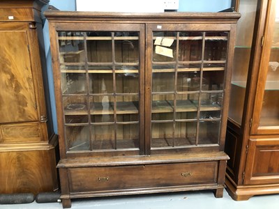 Lot 188a - An oak glazed bookcase. H 142 W 125 D 39cm.