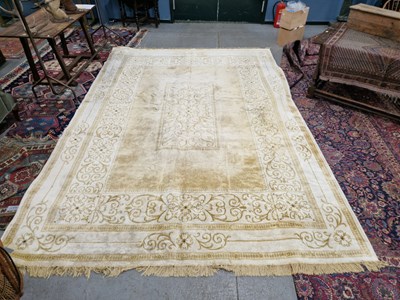Lot 1193 - A machine made carpet of neoclassical design
