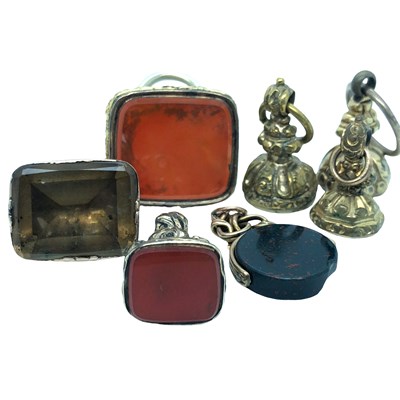 Lot 1091 - A mixed group of seven antique decorative fob...