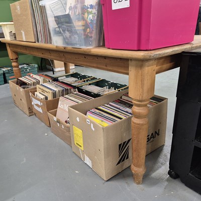 Lot 424 - A large pine kitchen table. H 76 W 90 D 213cm