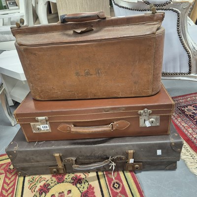 Lot 122 - Two vintage suitcases, a case containing some...