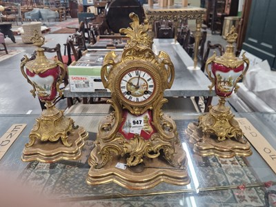 Lot 947 - A gilt metal and 'Sevres' style claret ground...
