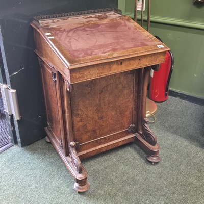 Lot 467 - An early Victorian walnut Davenport desk. H 86...