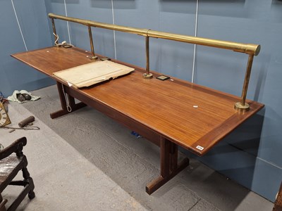 Lot 476 - A large hardwood library table with a brass...