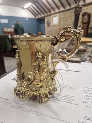Lot 1237 - A cased silver gilt christening set ,...