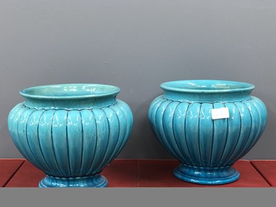 Lot 1246 - A pair of Burmantofts turquoise glazed...
