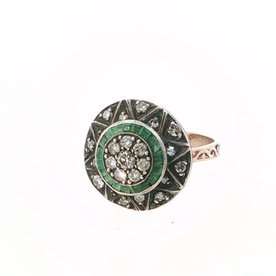Lot 1030 - An 8ct rose gold large target style dress ring...