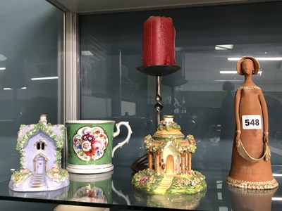 Lot 548 - Two porcealin cottages, a Coalport mug, a...