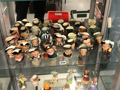 Lot 639 - Nineteen Doulton character jugs