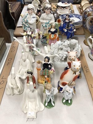 Lot 684 - A collection of figurines, German porcelain,...