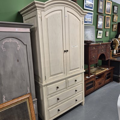 Lot 159 - An antique style painted wardrobe with hanging...