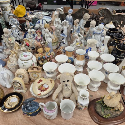 Lot 766 - A collection of figurines, small vases and...