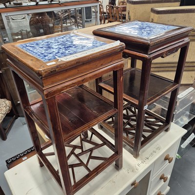 Lot 271 - A pair of oriental hardwood stands each with...