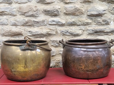 Lot 1133 - A copper and a brass cauldron both circular...