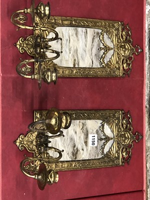 Lot 1150 - A pair of Victorian mirror backed brass two...