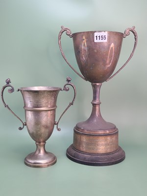 Lot 1155 - Four electroplate two handled trophy cups,...