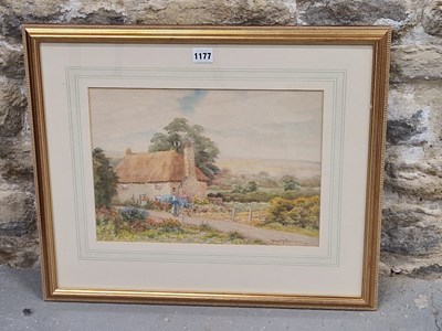Lot 1177 - George Oyston (1860-1937), a road by a...