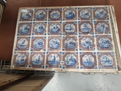 Lot 398 - A framed group of 24 individual early Delft tiles