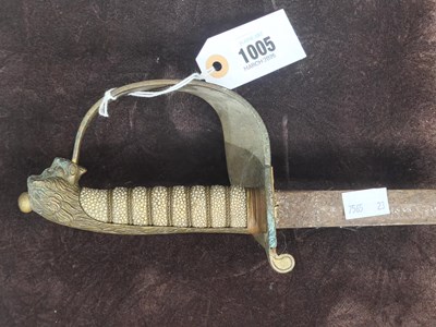 Lot 1005 - A naval officer's sword with a brass lion head...