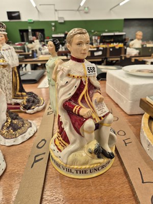 Lot 558 - A limited edition Peggy Davies pottery figural...