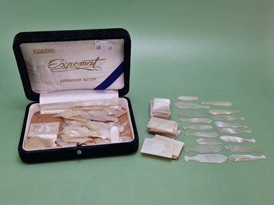 Lot 1085 - A collection of mother of pearl counters...