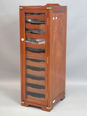 Lot 1088 - A Starbay glazed hardwood cabinet with a bank...