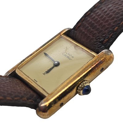 Lot 1135 - A silver and gold-plated vintage Must de...