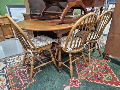 Lot 239 - A vintage extending dining table H 77 W 181 D...