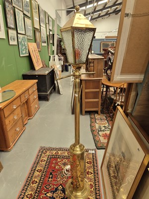 Lot 246 - A novelty brass standard lamp in the form of...