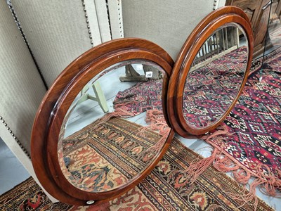 Lot 265 - A pair of large hardwood-framed port hole mirrors