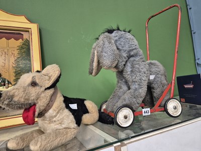 Lot 443 - A vintage push-along toy donkey and an...