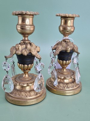 Lot 1085 - A pair of bronze and ormolu lustre...
