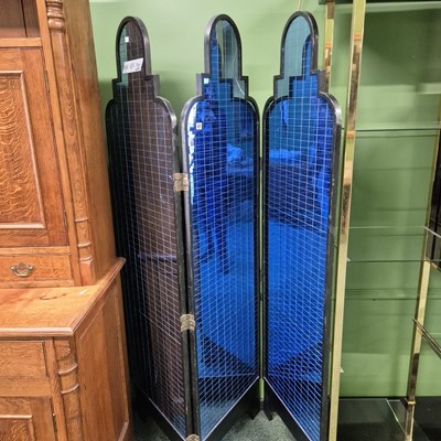 Lot 427 - An Art Deco blue glass mirrored three-fold...