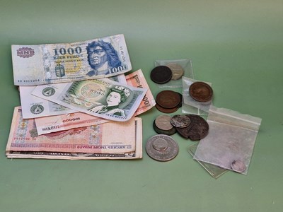 Lot 1299 - A small collection of coins and vintage banknotes