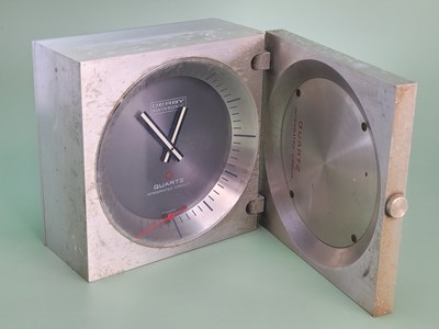 Lot 1710 - A Derby Swissonic desk clock in a billet...