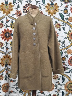 Lot 61 - Clothing - An olive green wool coat by Geiger...