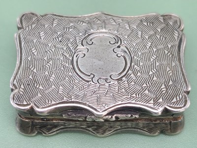 Lot 1395 - A silver vinaigrette, the rectangular lid...