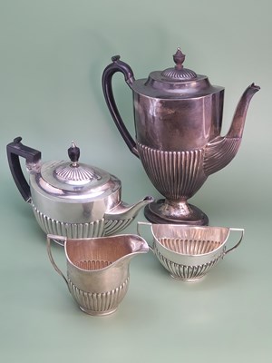 Lot 1404 - A three piece silver tea set,William Hutton,...