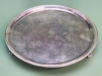 Lot 1407 - A George III silver tripod waiter engraved...