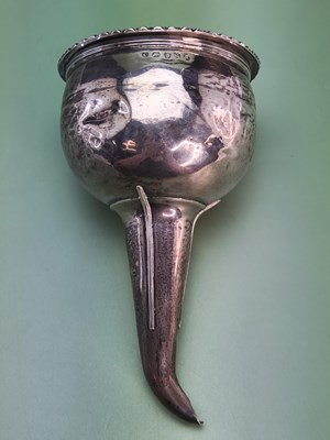 Lot 1414 - A George III silver wine funnel, London 1813,...