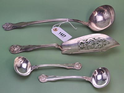 Lot 1427 - A shell and thread pattern silver soup ladle,...